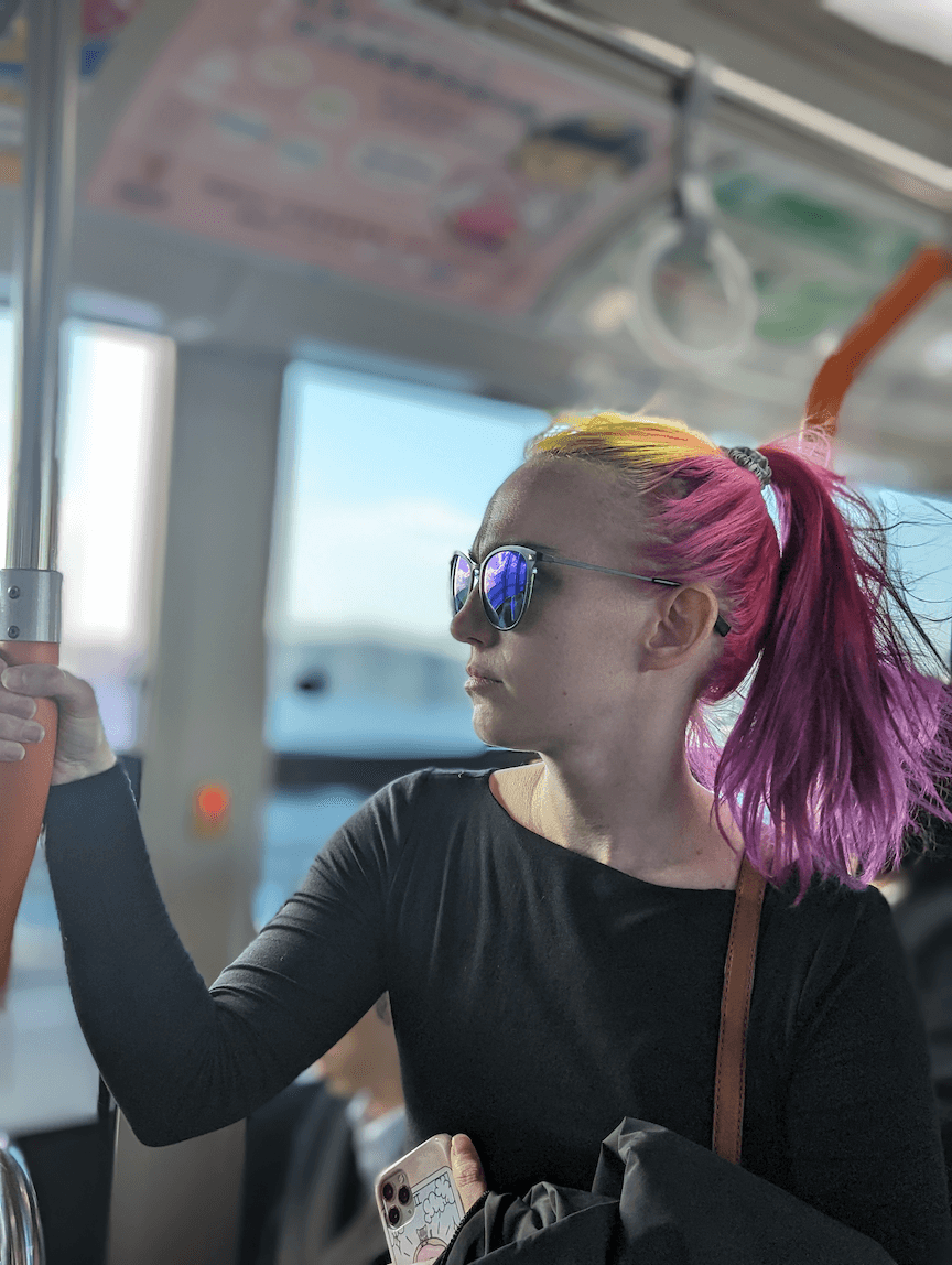 Ariana Faraday on a bus in Tokyo.